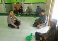 Bhabinkamtibmas Polsek Tanjung Pura Sambangi Warga Desa Baja Kuning, Sampaikan Pesan Kamtibmas