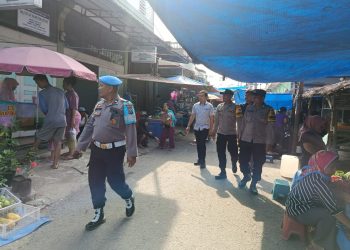 Patroli Polsek Salapian Sasar Pajak Tanjung Langkat, Cegah Kejahatan dan Gangguan Kamtibmas