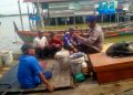 Patroli Sambang Nelayan, Satpolairud Polres Langkat Sampaikan Imbauan Waspada Cuaca Ekstrem