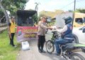Polsek Kuala, Berbagi Nasi Kotak Sambil Pererat Kedekatan dengan Masyarakat