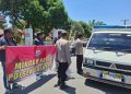Minggu Kasih Polsek Salapian, Berbagi Nasi untuk Warga yang Melintas