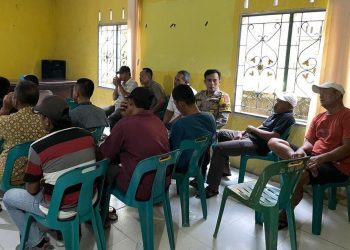 Rakor Bersama Pemerintah Desa, Bhabinkamtibmas Padang Tualang Ajak Warga Aktifkan Pos Kamling